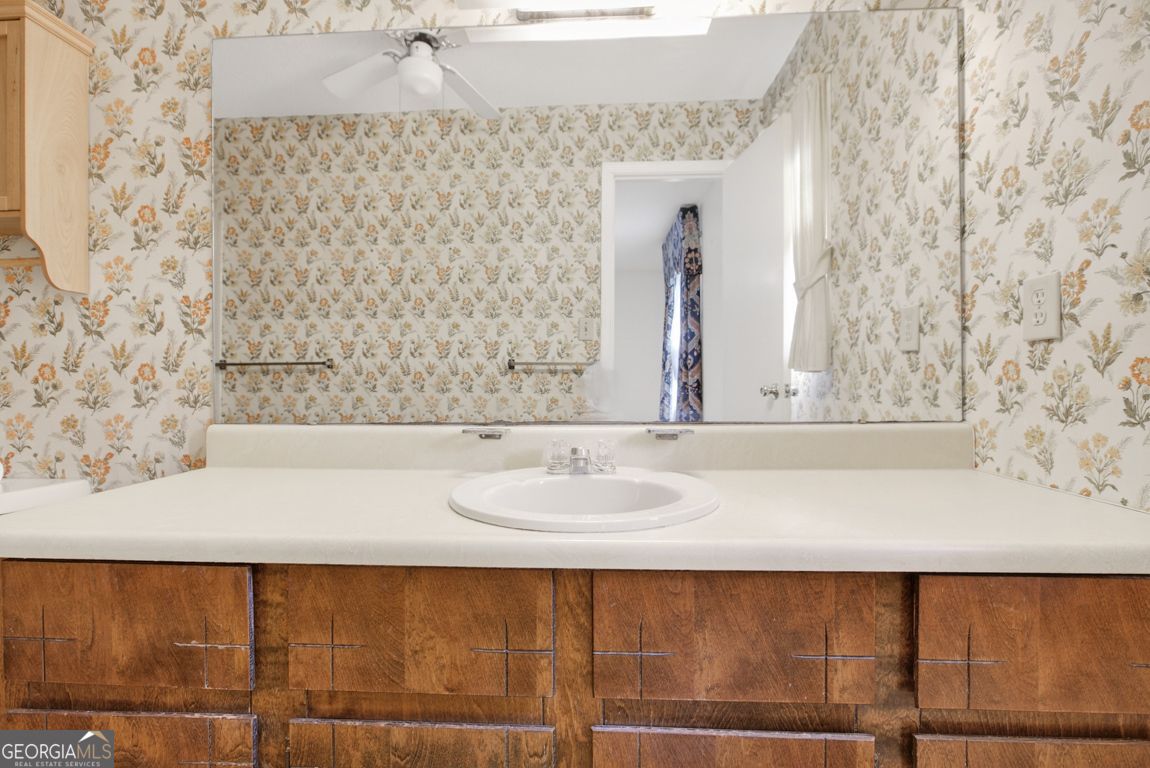 3369 Sandy Circle Macon, GA 31216 - Photo 40 of 65 a bathroom with a bathtub and a sink