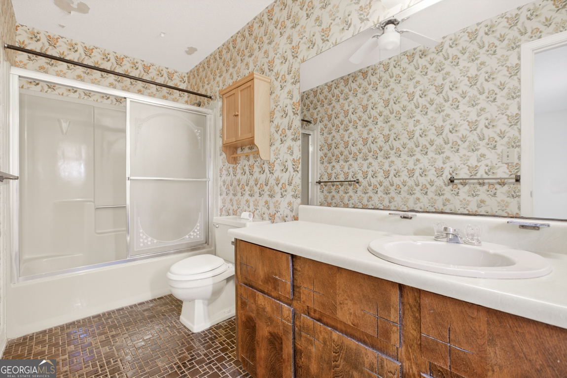 3369 Sandy Circle Macon, GA 31216 - Photo 41 of 65 a bathroom with a sink toilet and shower