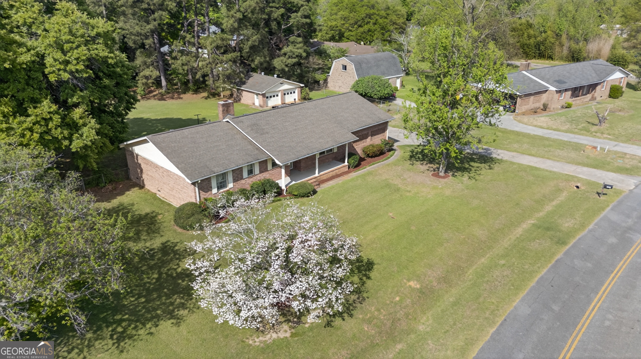 3369 Sandy Circle Macon, GA 31216 - Photo 58 of 65 an aerial view of a house with garden space and trees