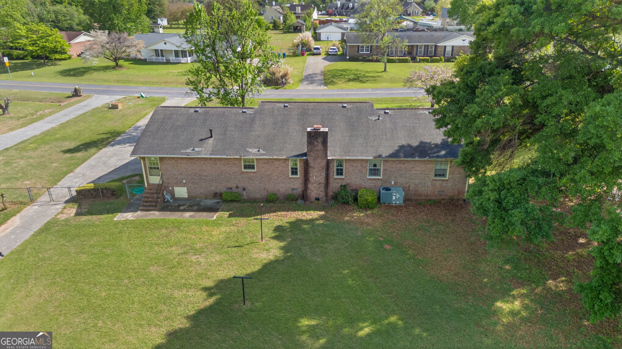 3369 Sandy Circle Macon, GA 31216 - Photo 59 of 65 an aerial view of a house with a yard