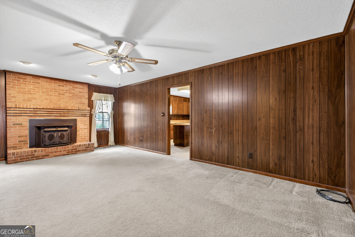 3369 Sandy Circle Macon, GA 31216 - Photo 6 of 65 a view of an empty room with a fireplace