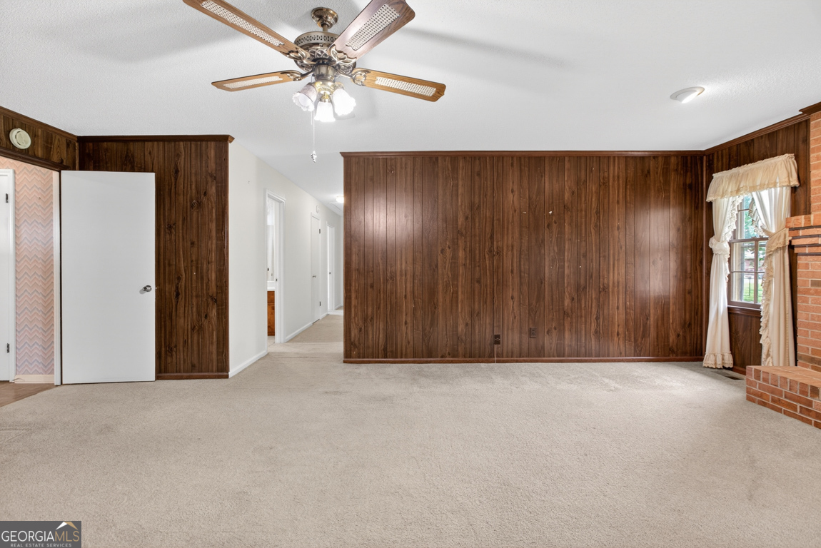 3369 Sandy Circle Macon, GA 31216 - Photo 8 of 65 a view of a livingroom with a chandelier fan
