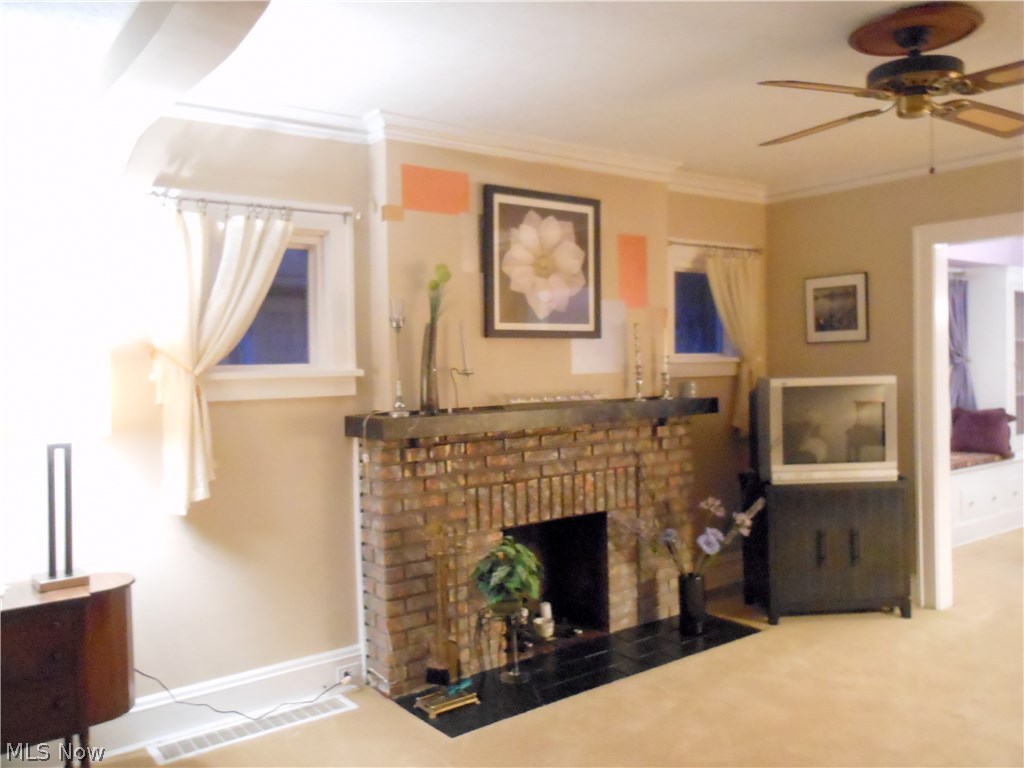 891 Montford Road Cleveland, OH 44121 - Photo 21 of 25 Living Room with view to the dining room