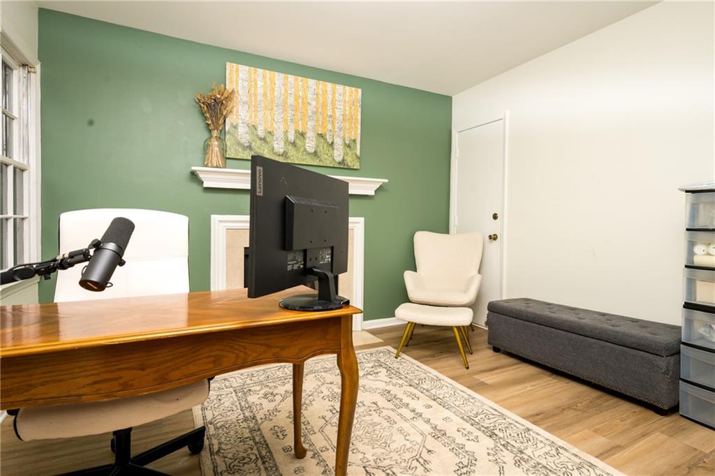 127 Lablanc Way Northwest Atlanta, GA 30327 - Photo 8 of 25 a living room with furniture and a fireplace