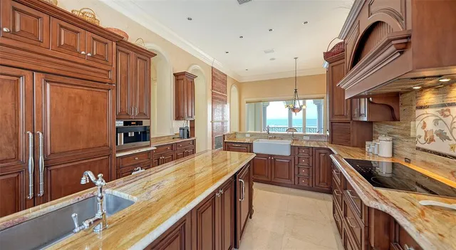 a balcony with table and chairs