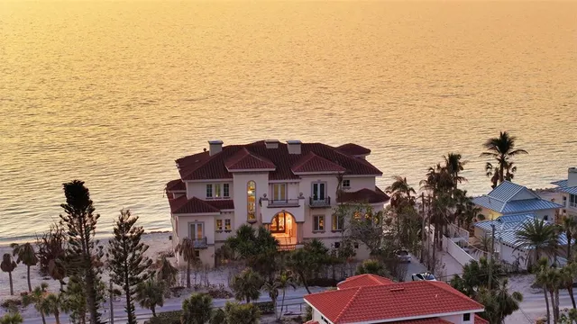 a view of a lake with a building in the background