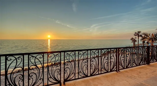 a spacious bathroom with a granite countertop sink and a mirror