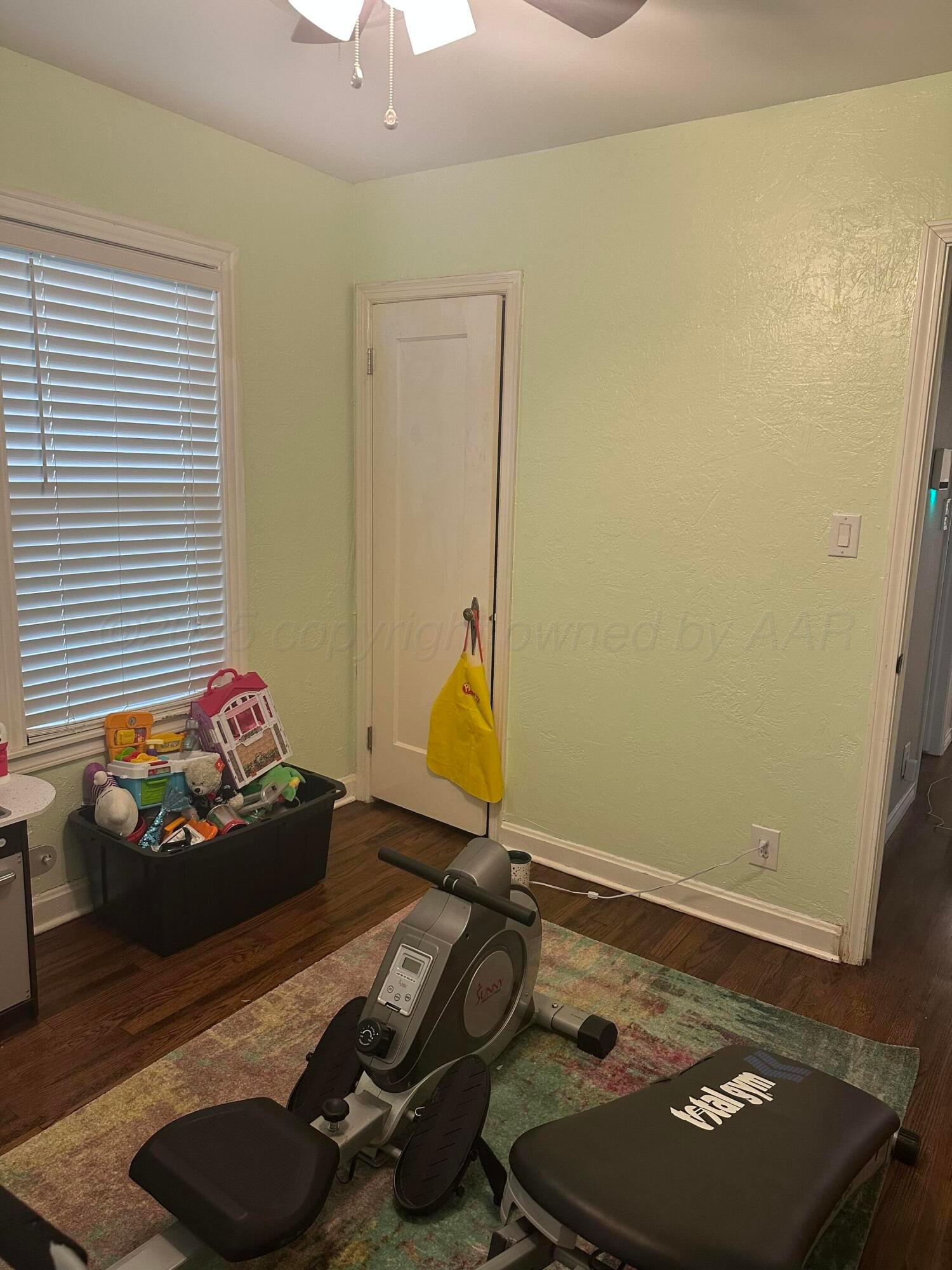 1118 Bellaire Street Amarillo, TX 79106 - Photo 20 of 36 a room with gym equipment