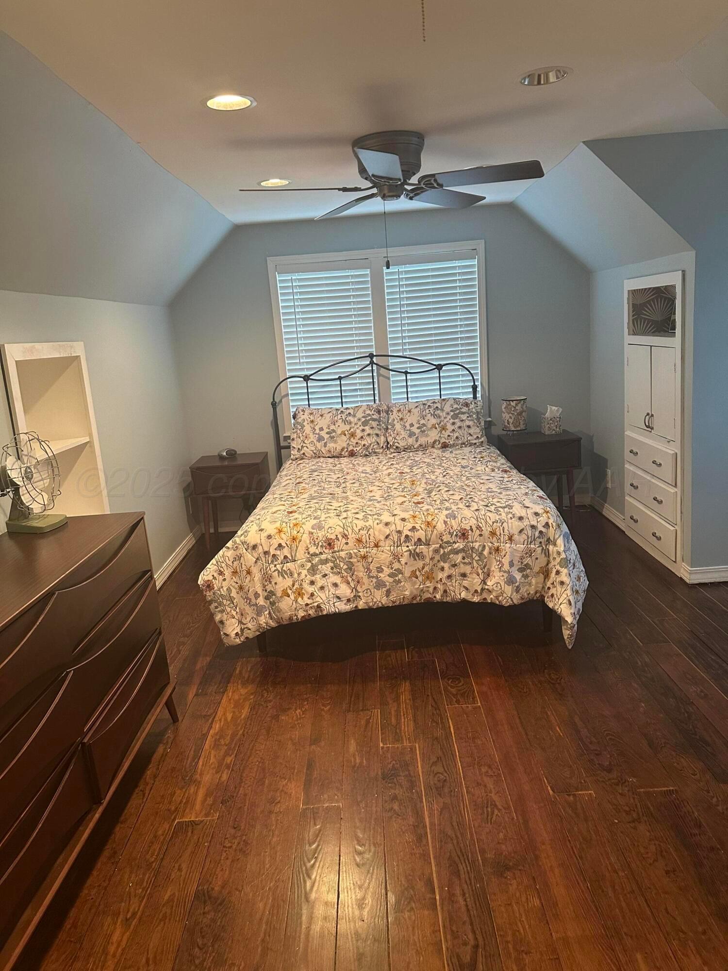 1118 Bellaire Street Amarillo, TX 79106 - Photo 22 of 36 a bedroom with a bed and a window