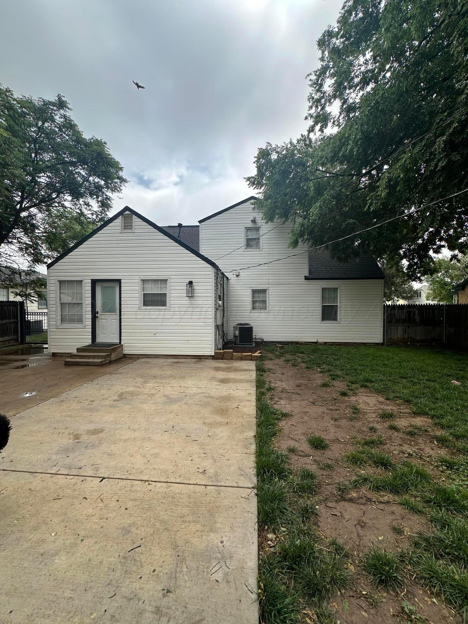 1118 Bellaire Street Amarillo, TX 79106 - Photo 33 of 36 a view of a house with a yard