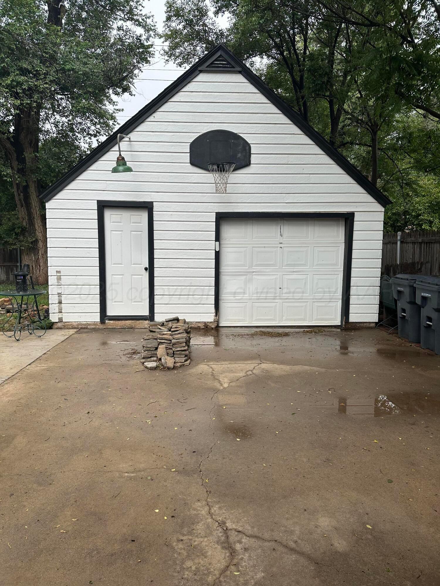 1118 Bellaire Street Amarillo, TX 79106 - Photo 35 of 36 a house with trees in front of it