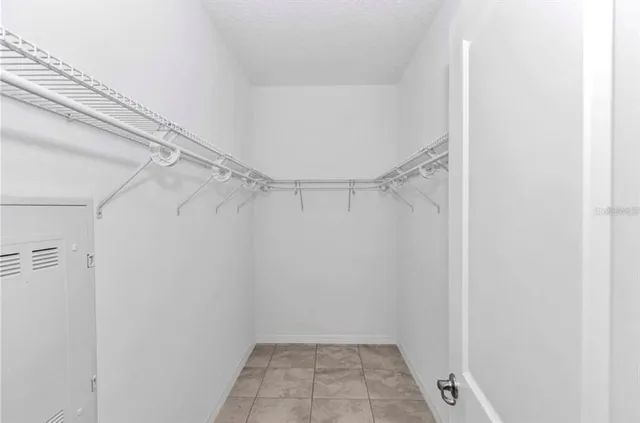 a bathroom with a granite countertop sink mirror and double