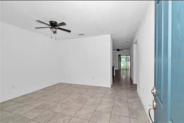 a view of a hallway with closet