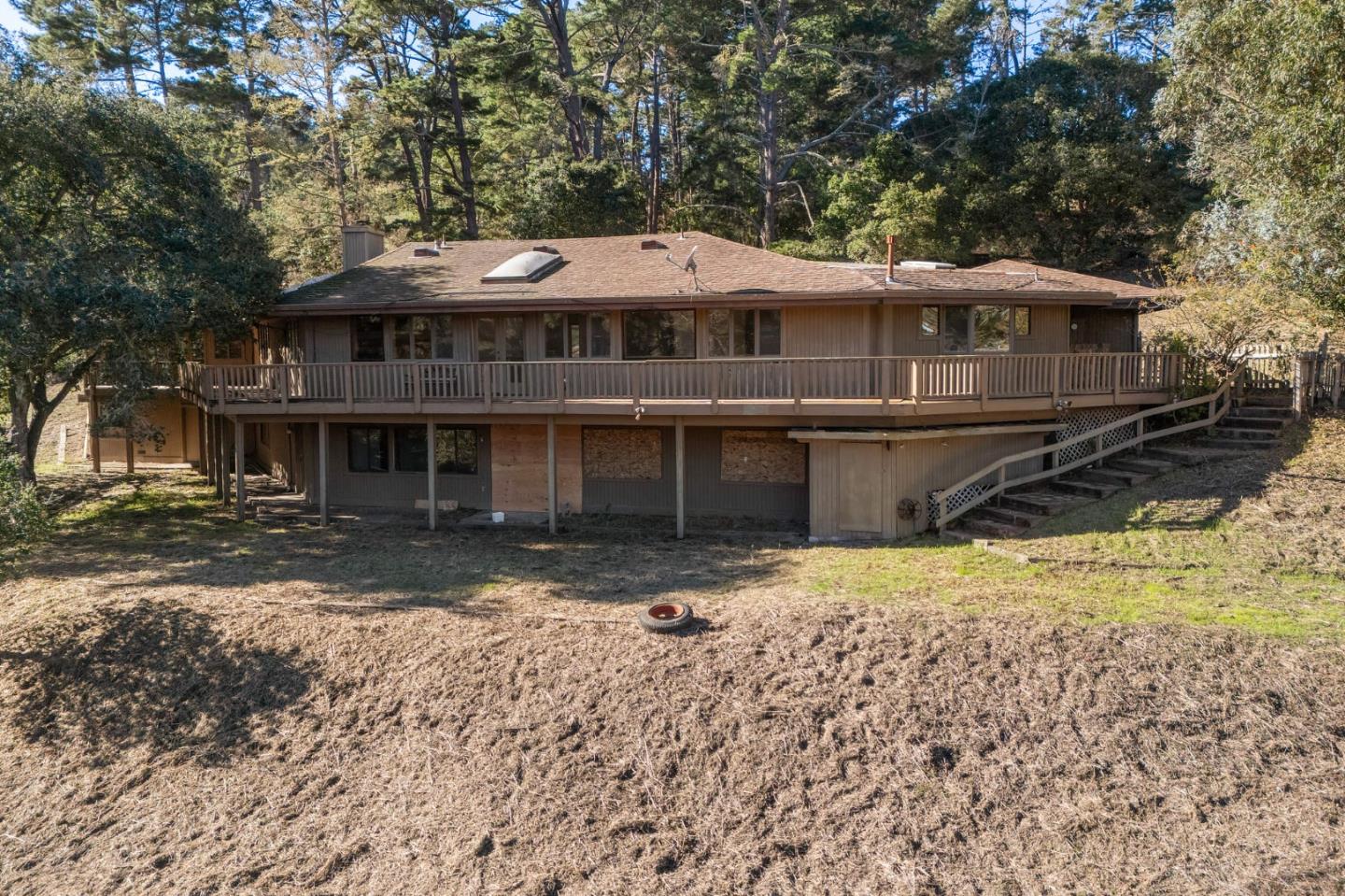 537 Aguajito Road Carmel, CA 93923 - Photo 4 of 7 a front view of a house with a yard