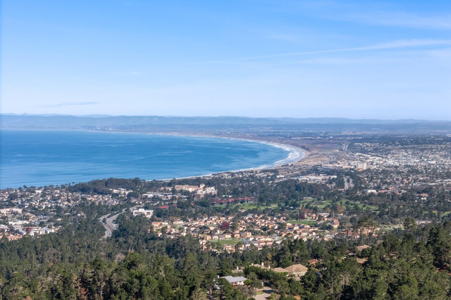537 Aguajito Road Carmel, CA 93923 - Photo 7 of 7 an aerial view of ocean and trees