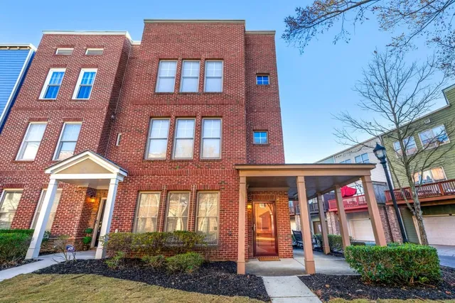 a front view of a multi story residential apartment building