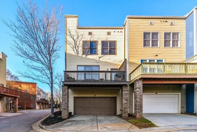 a front view of a house with a garage