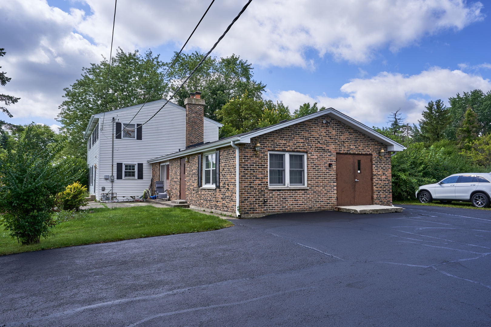 24W175 Hobson Road Naperville, IL 60540 - Photo 2 of 30 a view of a house with a yard