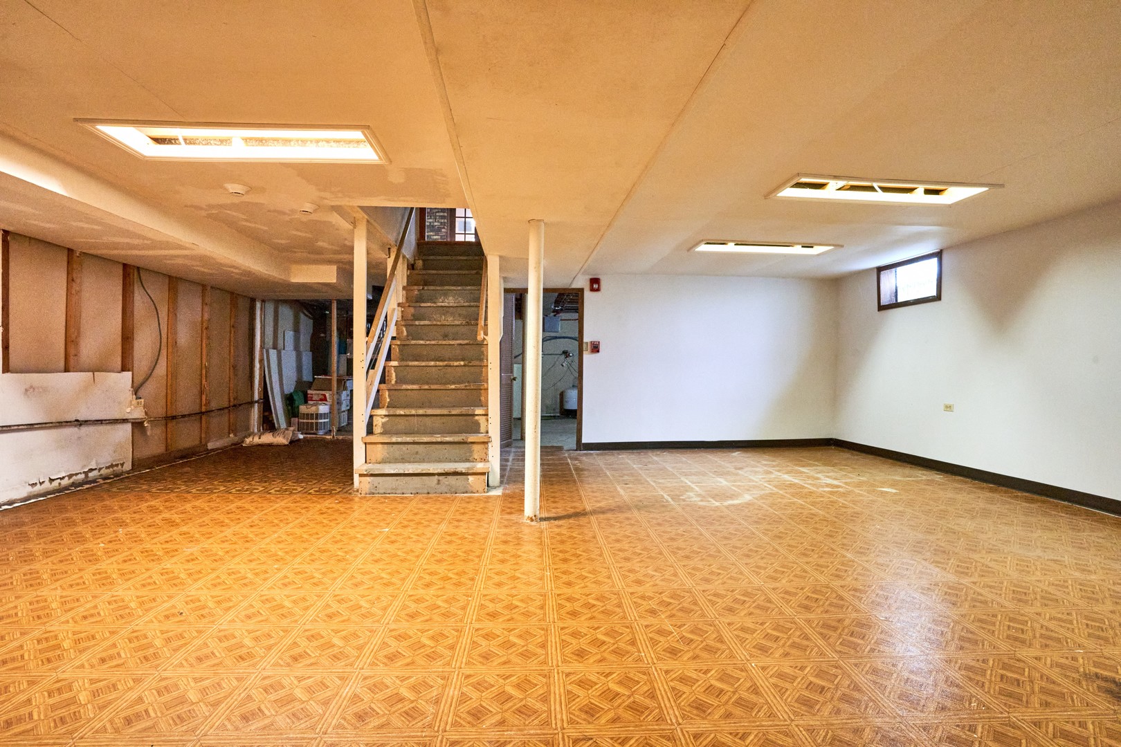 24W175 Hobson Road Naperville, IL 60540 - Photo 27 of 30 a view of an empty room with stairs