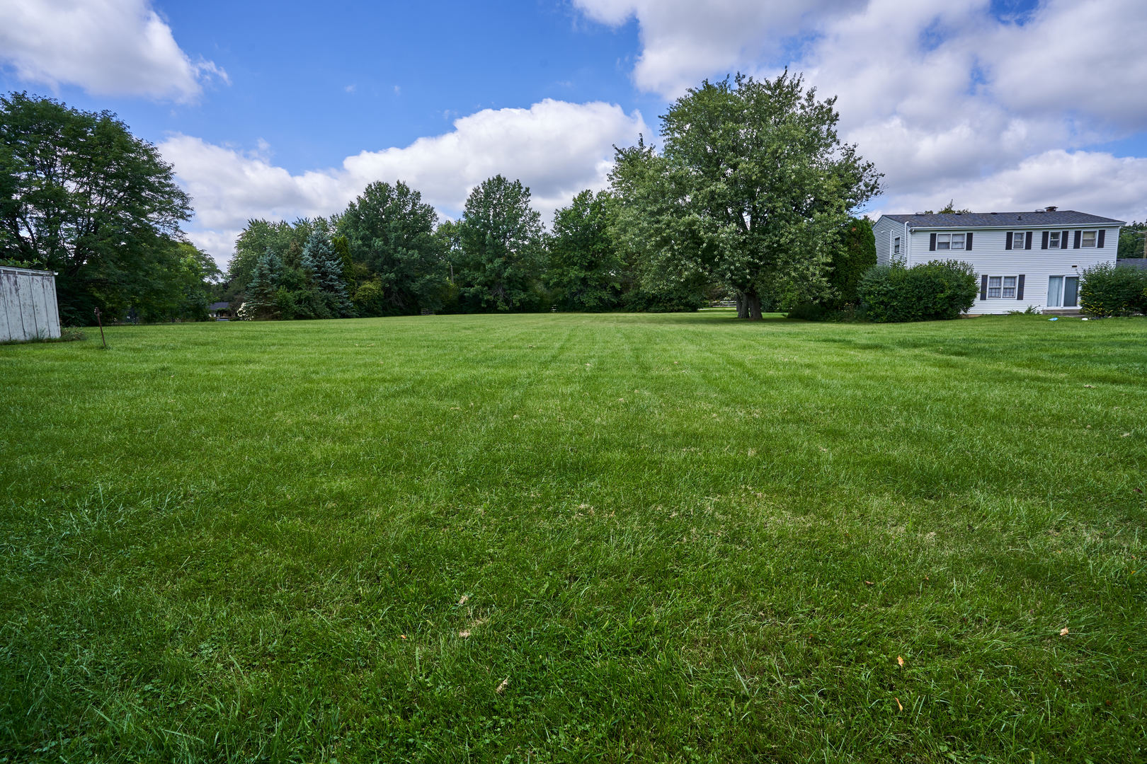 24W175 Hobson Road Naperville, IL 60540 - Photo 6 of 30 a view of a house next to a yard