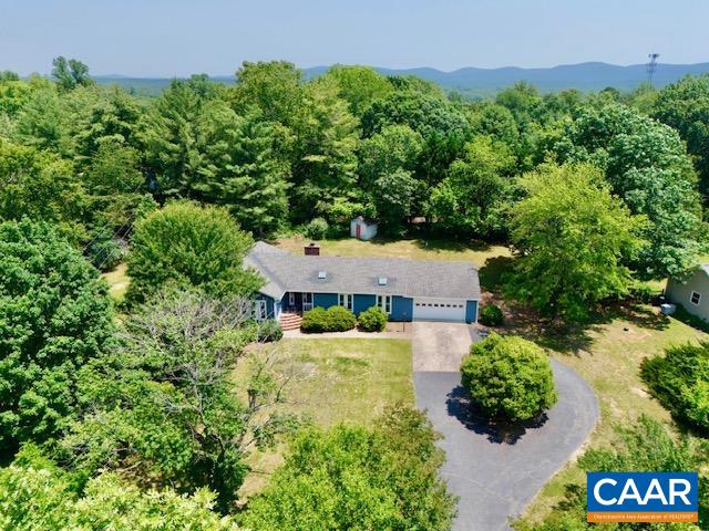2583 Rio Mills Road Earlysville, VA 22936 - Photo 2 of 41 an aerial view of a house with a yard and a large tree