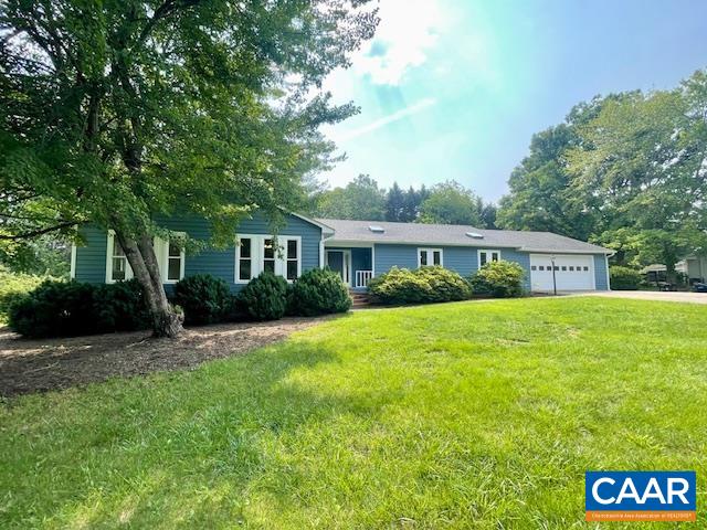 2583 Rio Mills Road Earlysville, VA 22936 - Photo 38 of 41 a front view of a house with a yard