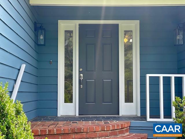 2583 Rio Mills Road Earlysville, VA 22936 - Photo 5 of 41 a view of front door of house