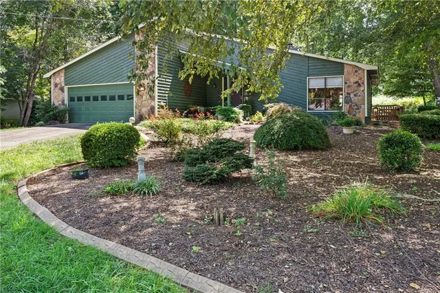 a view of a backyard with garden