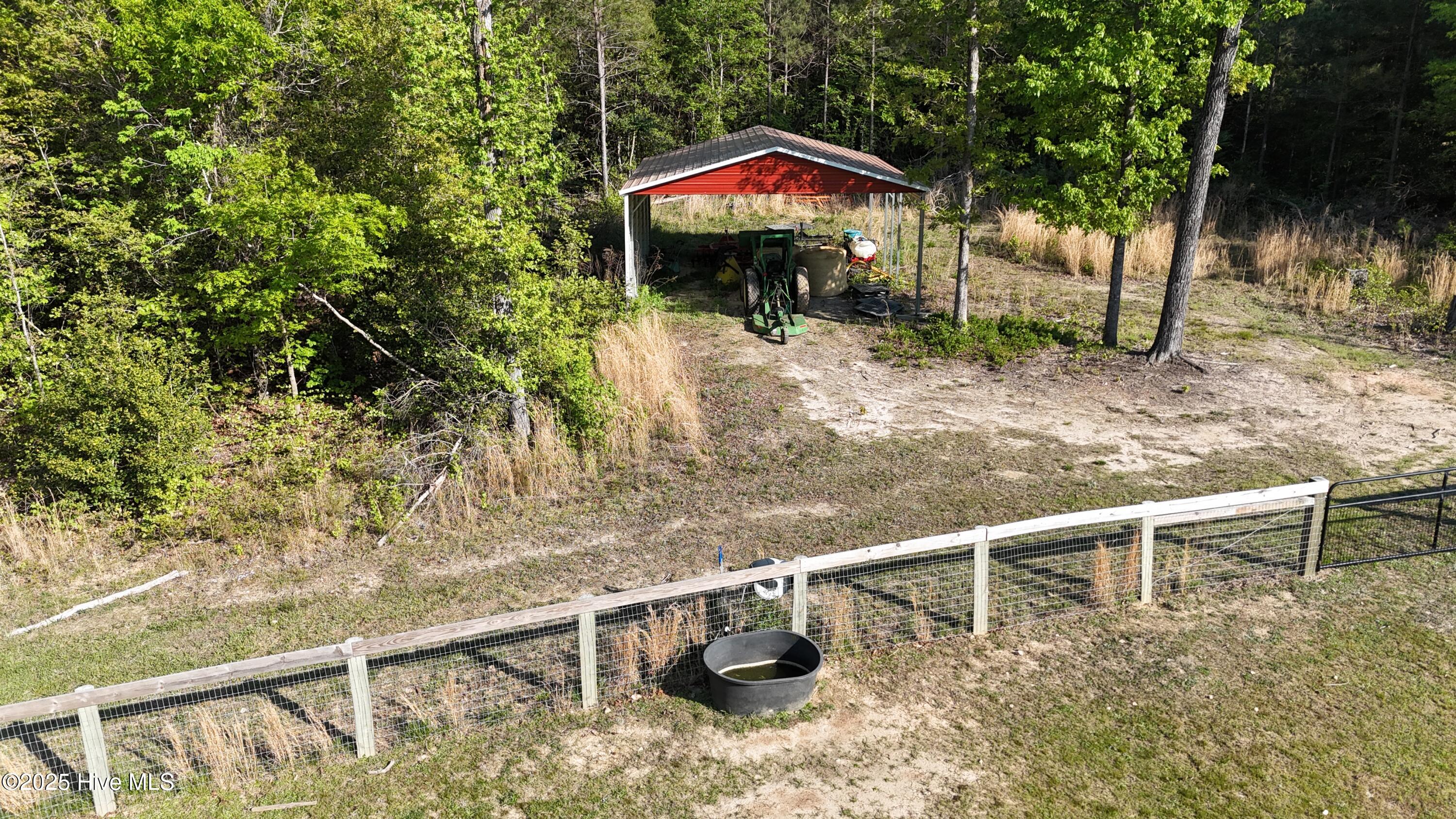 104 Bridle Path Lane Carthage, NC 28327 - Photo 23 of 90 Tractor Cover