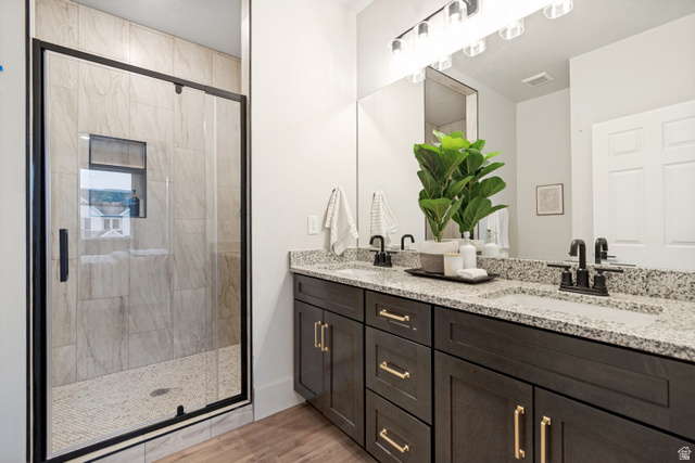 529 North Hvn Drive Mapleton, UT 84664 - Photo 18 of 30 Dual vanity featuring granite countertops and undermount sinks with matte black fixtures