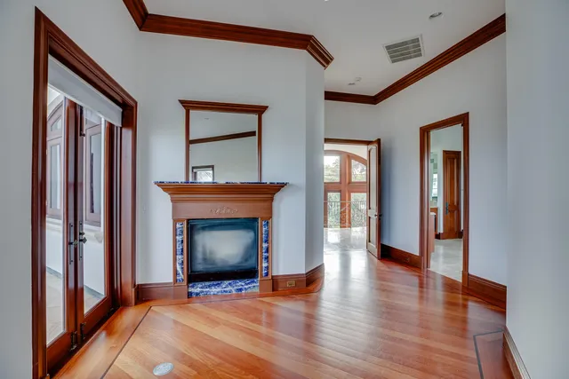 a bathroom with a granite countertop sink mirror and shower