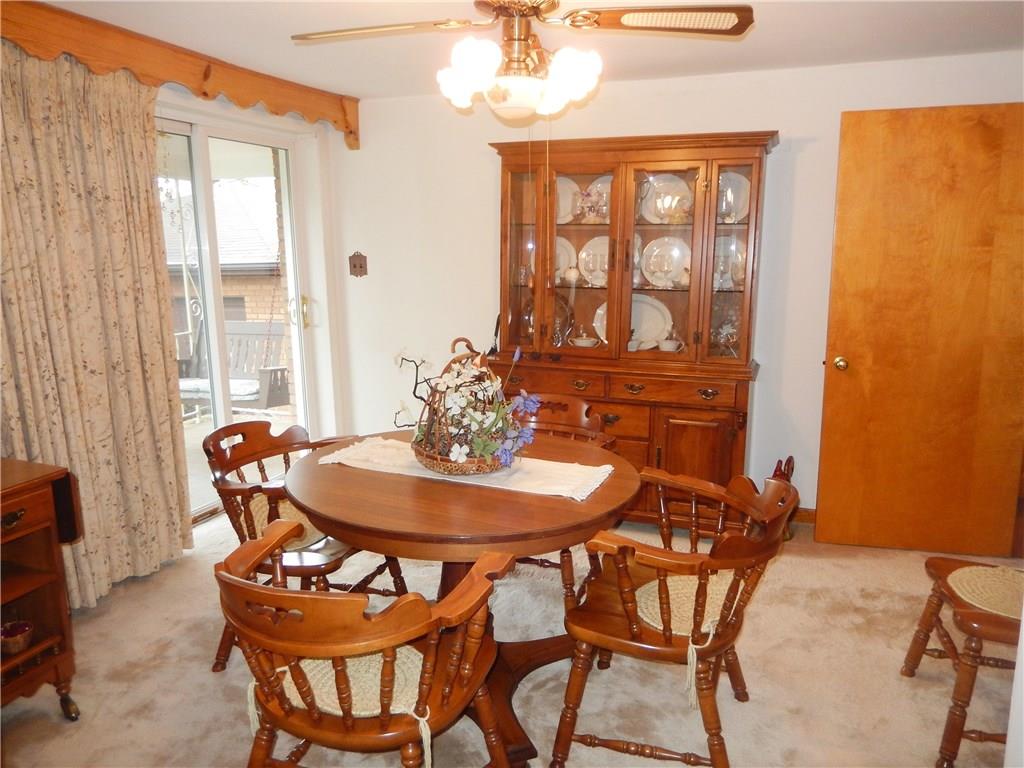 266 Buckeye Road Mount Pleasant, PA 15666 - Photo 5 of 19 Host holiday dinners and enjoy the casual dining area with doors to the side covered porch.