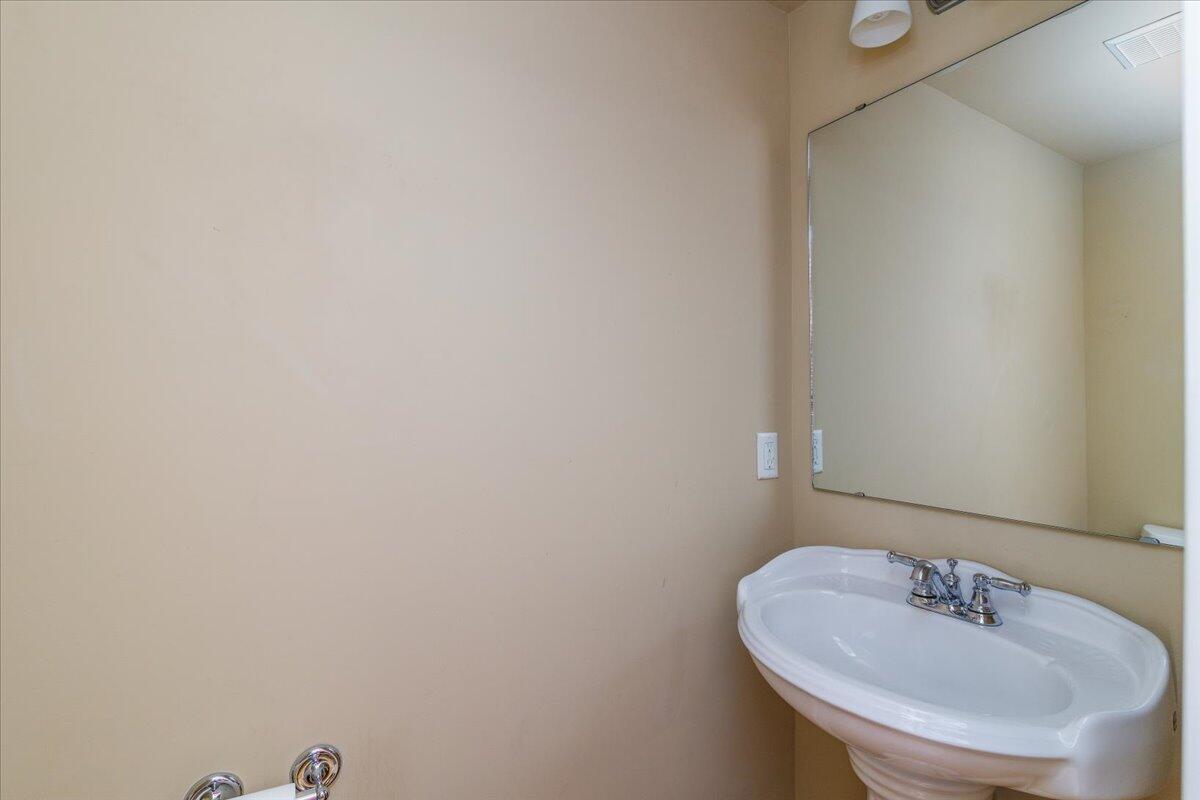 324 Salem Avenue Southwest, Unit 303 Roanoke, VA 24016 - Photo 16 of 21 a bathroom with a sink and a mirror
