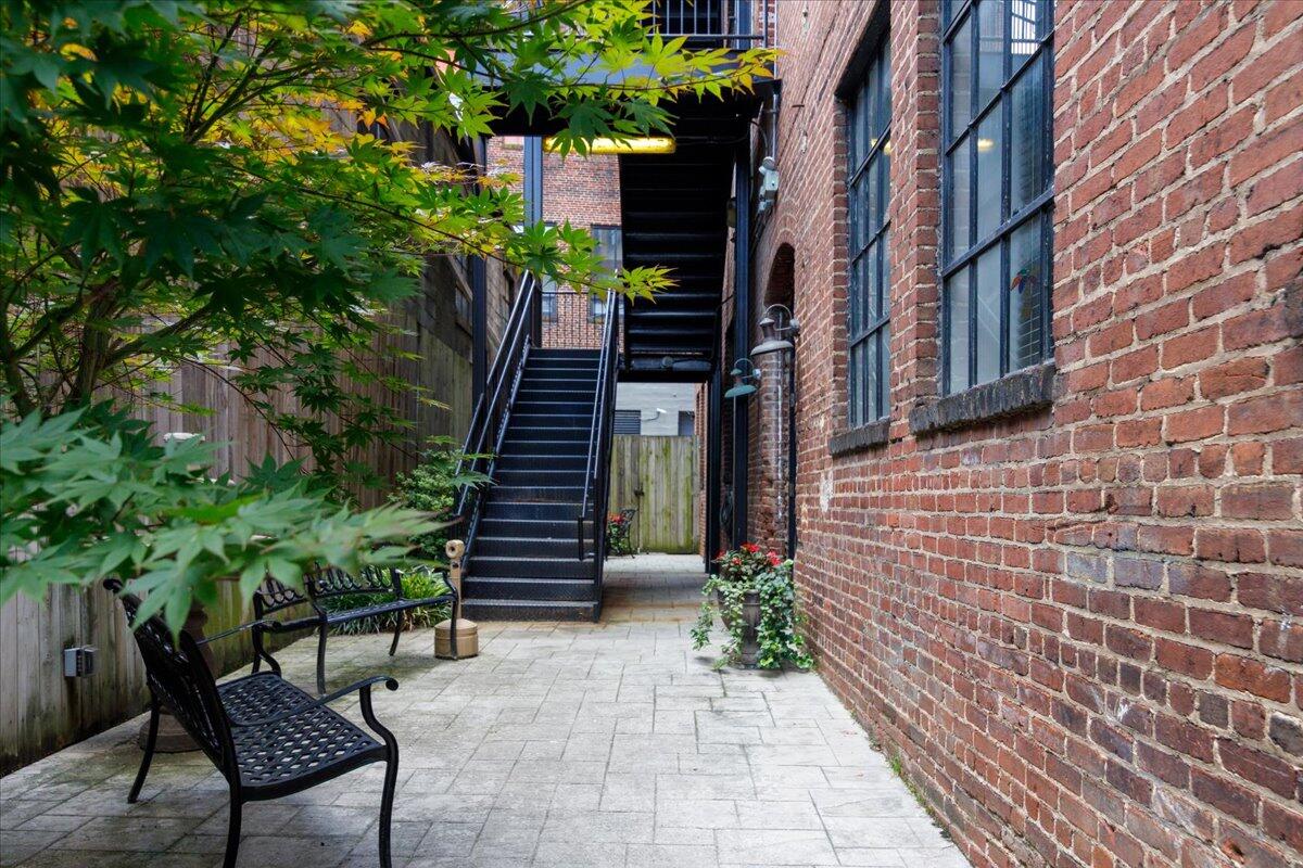 324 Salem Avenue Southwest, Unit 303 Roanoke, VA 24016 - Photo 20 of 21 a view of a pathway with a house in the background