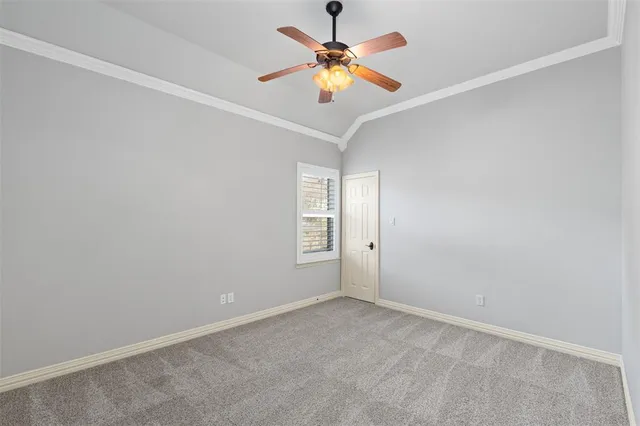 a bathroom with a granite countertop sink a mirror and a shower