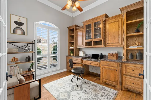 a kitchen with stainless steel appliances granite countertop a stove and cabinets
