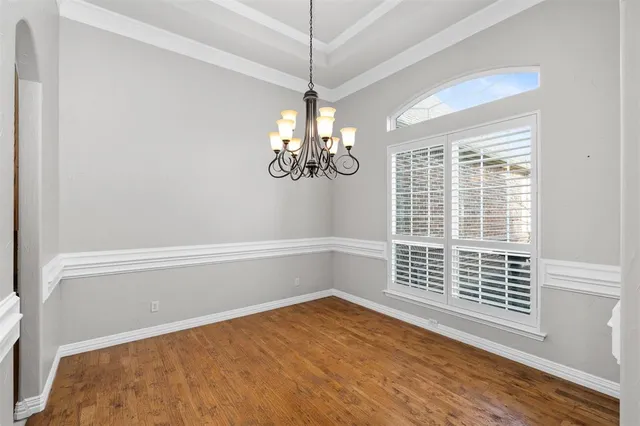 a living room with fireplace furniture and a flat screen tv