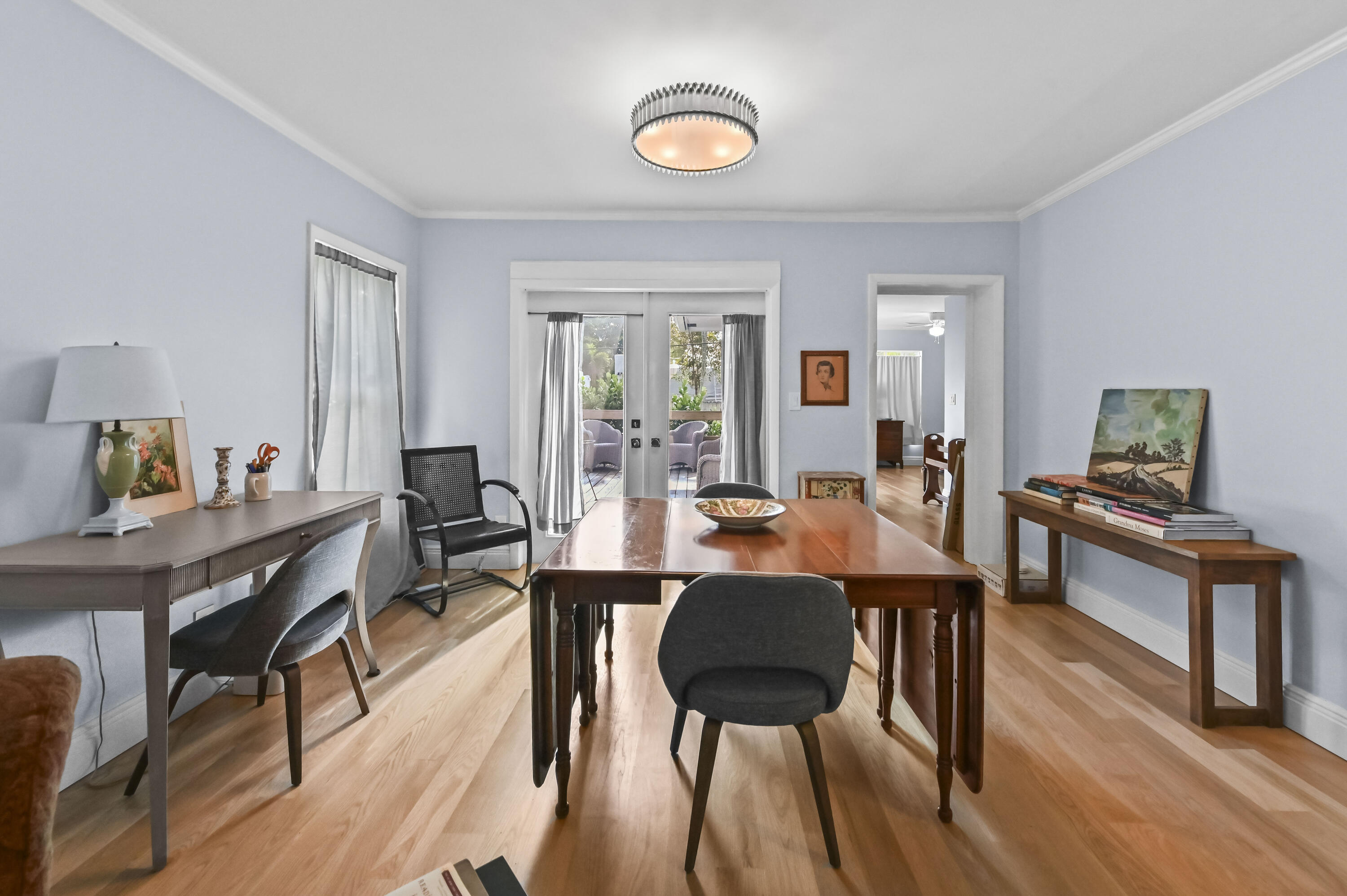 604 Ardmore Road West Palm Beach, FL 33401 - Photo 11 of 15 a view of a dining room with furniture window and wooden floor