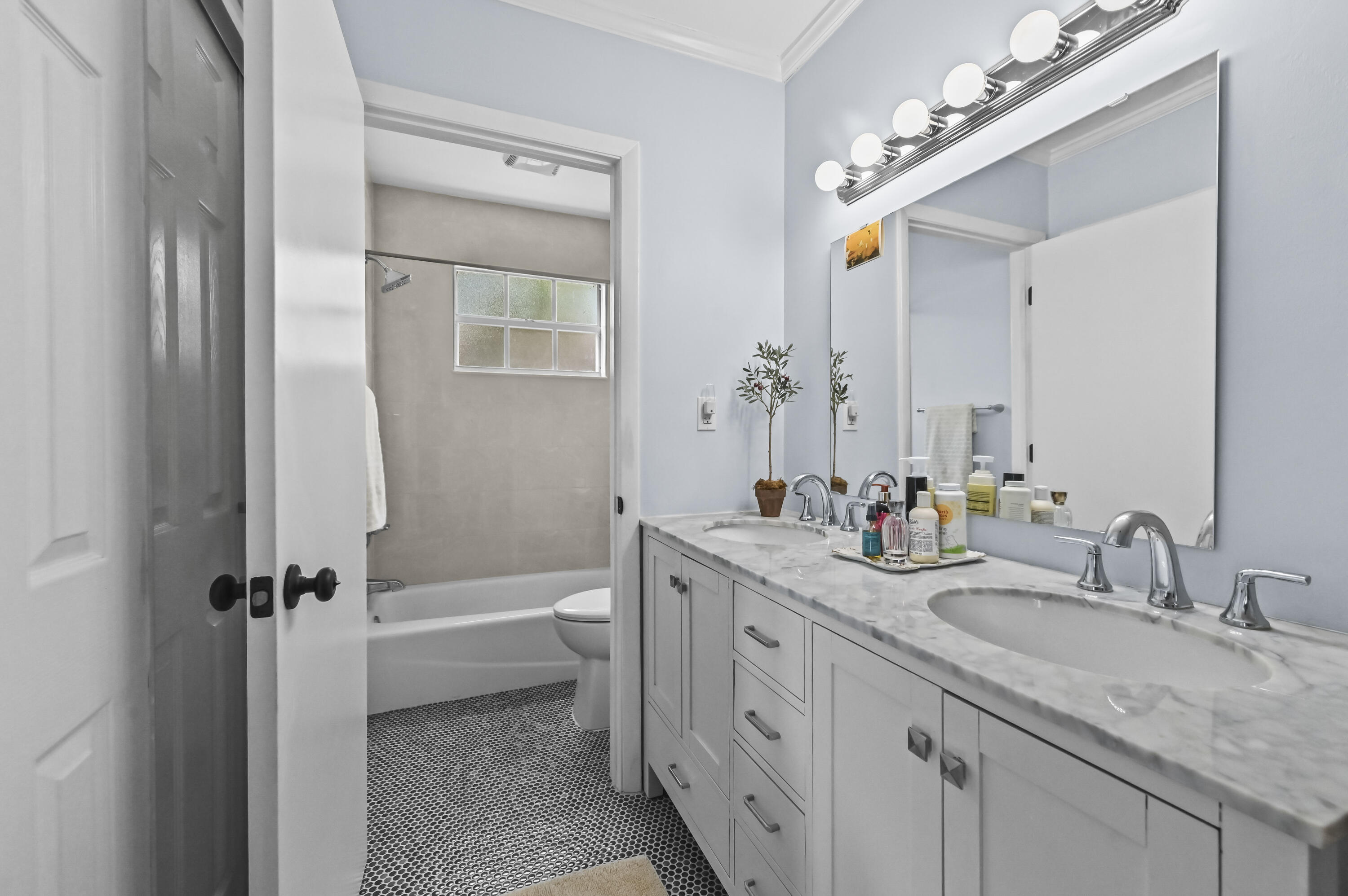 604 Ardmore Road West Palm Beach, FL 33401 - Photo 7 of 15 a bathroom with a granite countertop sink mirror toilet and bathtub