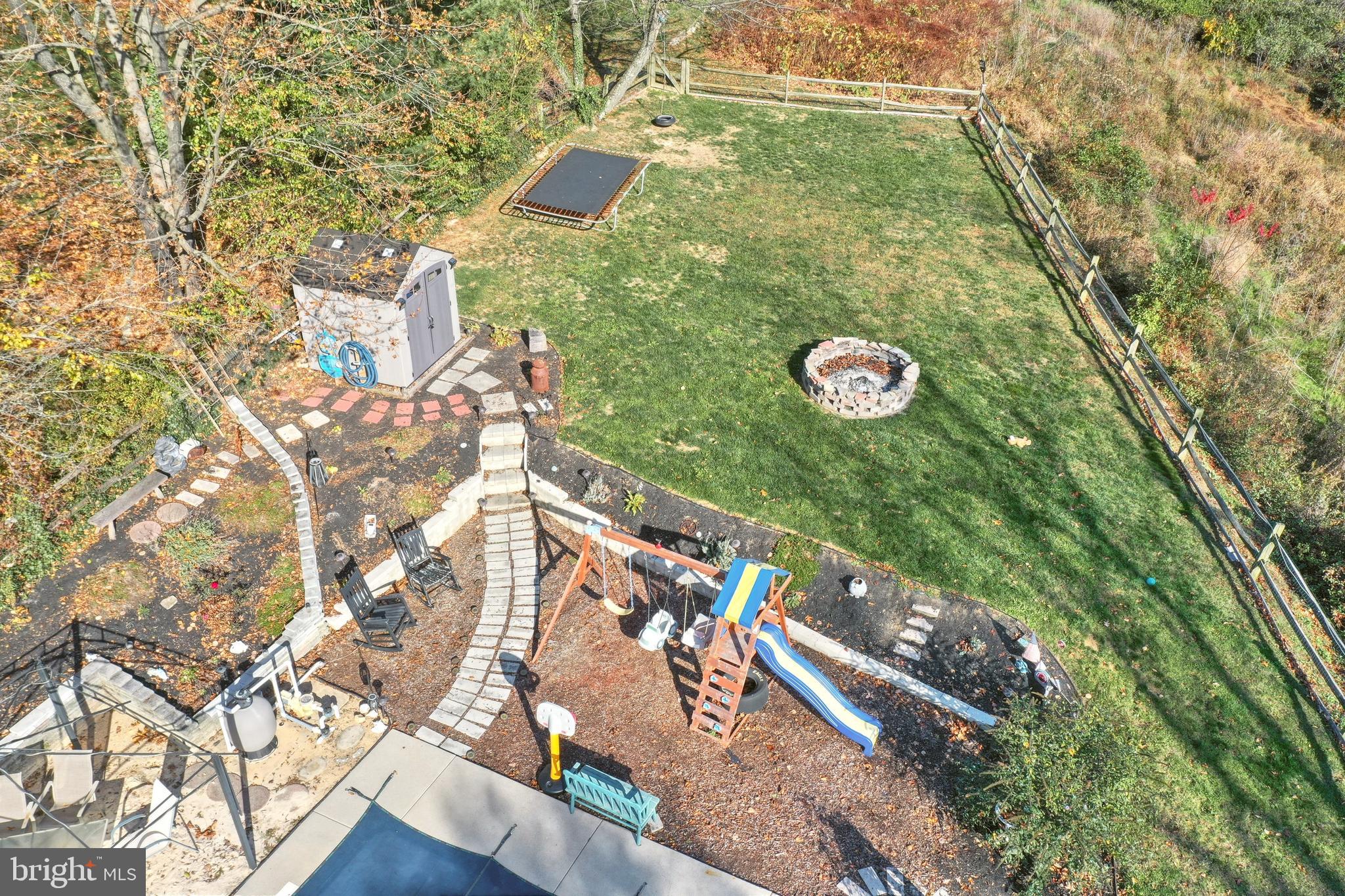 1140 Kalreda Road York, PA 17406 - Photo 37 of 51 Back yard play area and firepit