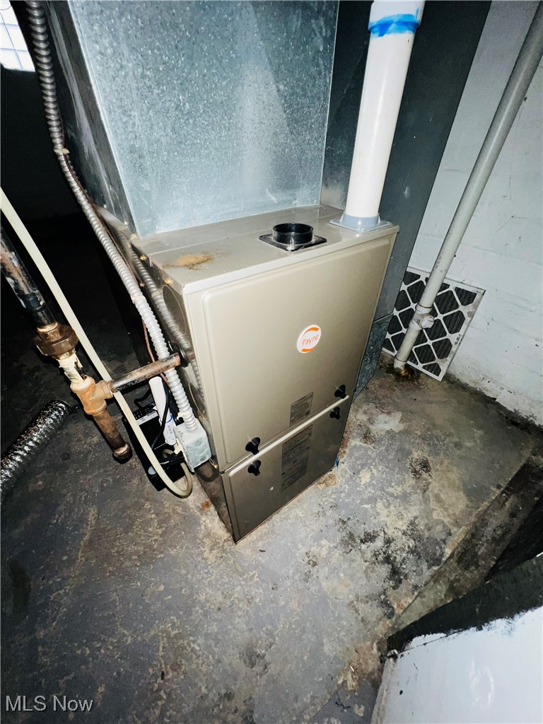 968 Whitby Road Cleveland Heights, OH 44112 - Photo 14 of 19 Utility room with heating unit