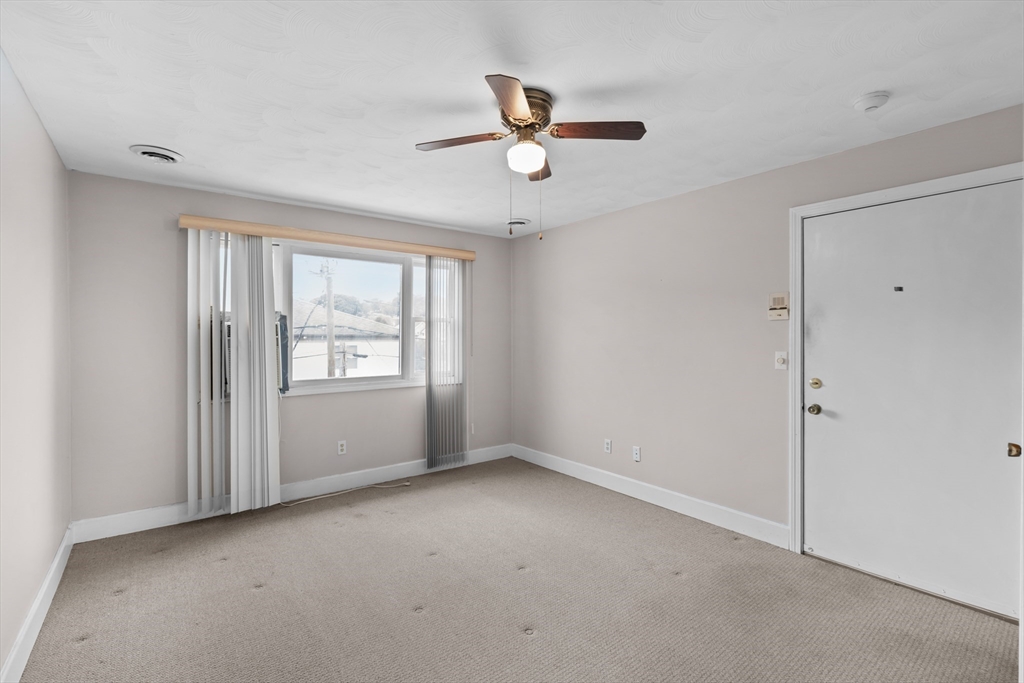 70 North Court Street, Unit F Fall River, MA 02720 - Photo 4 of 20 a view of an empty room with a window