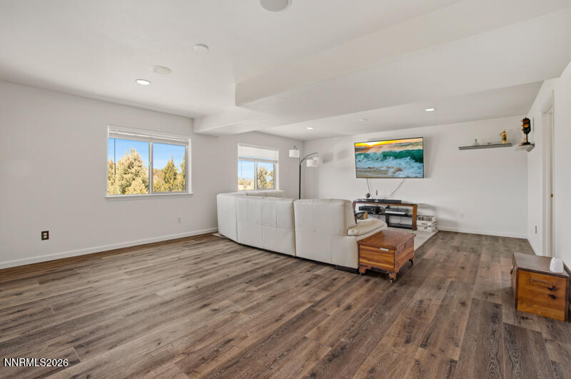1367 Calavaras Road Reno, NV 89521 - Photo 15 of 26 a living room with furniture and a wooden floor
