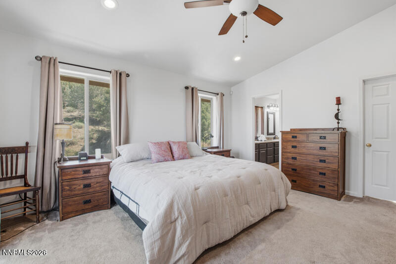 1367 Calavaras Road Reno, NV 89521 - Photo 10 of 26 a bedroom with a bed dresser and a window