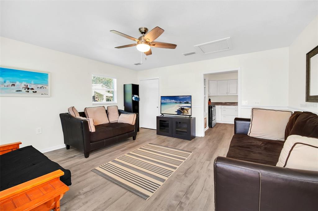 5 Southeast Ocale Way Summerfield, FL 34491 - Photo 3 of 18 a living room with furniture and a couch