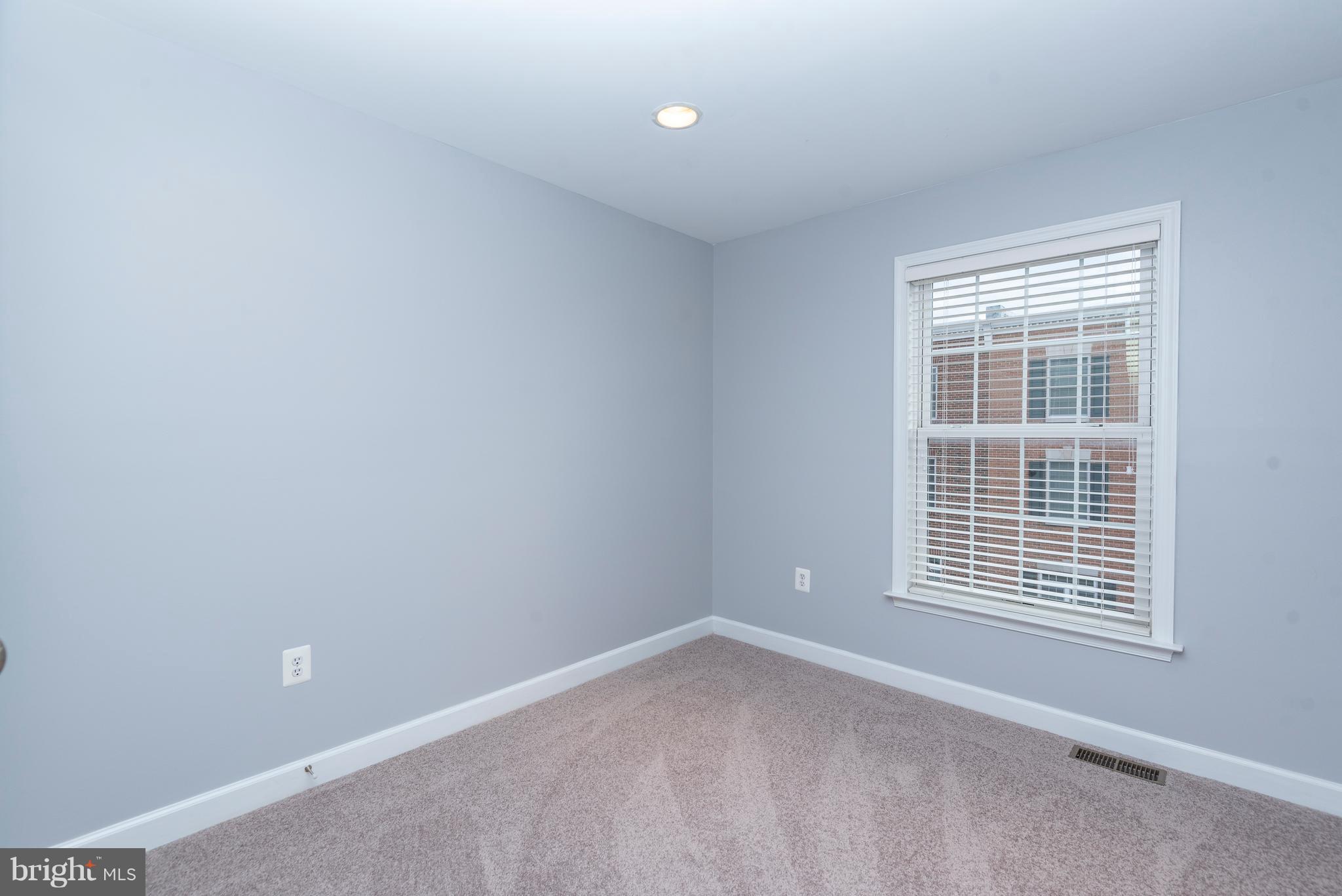 1510 Stack Street Baltimore, MD 21230 - Photo 18 of 32 an empty room with a window