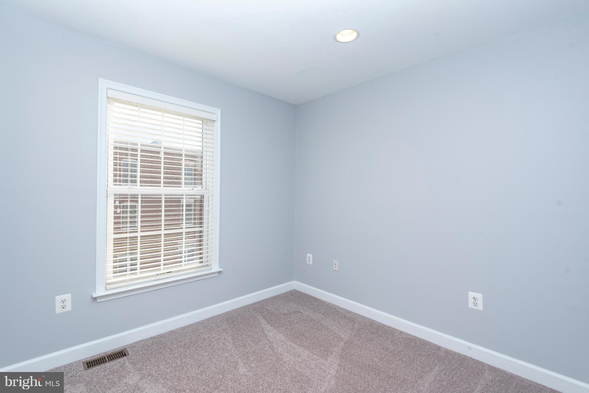 1510 Stack Street Baltimore, MD 21230 - Photo 20 of 32 an empty room with a window