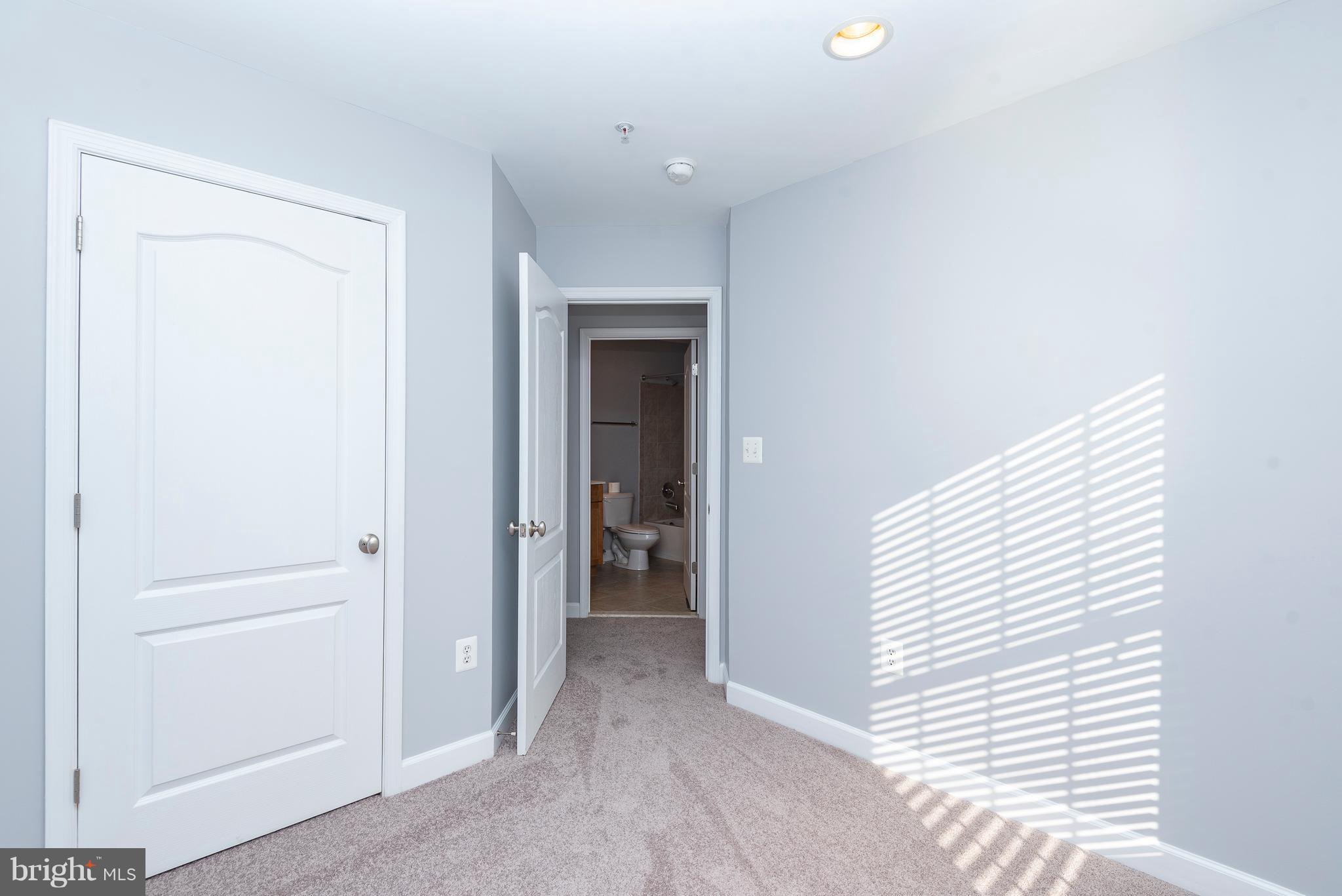 1510 Stack Street Baltimore, MD 21230 - Photo 21 of 32 a view of a hallway with closet and bathroom
