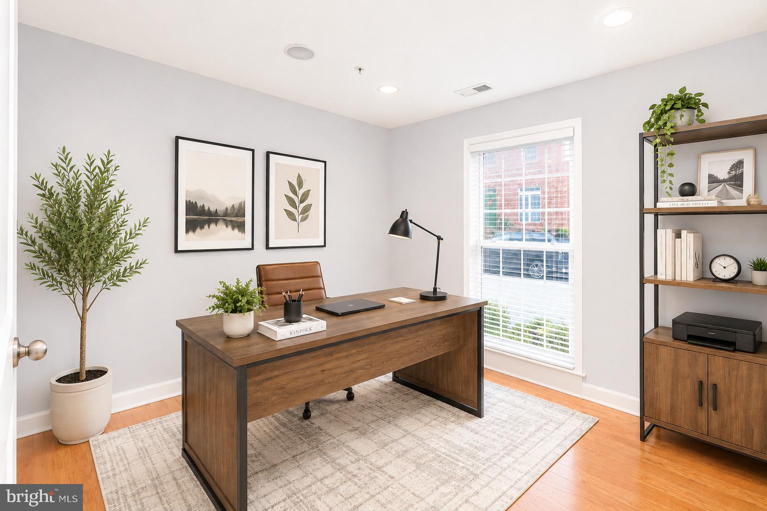 1510 Stack Street Baltimore, MD 21230 - Photo 3 of 32 a view of a workspace with furniture and a potted plant