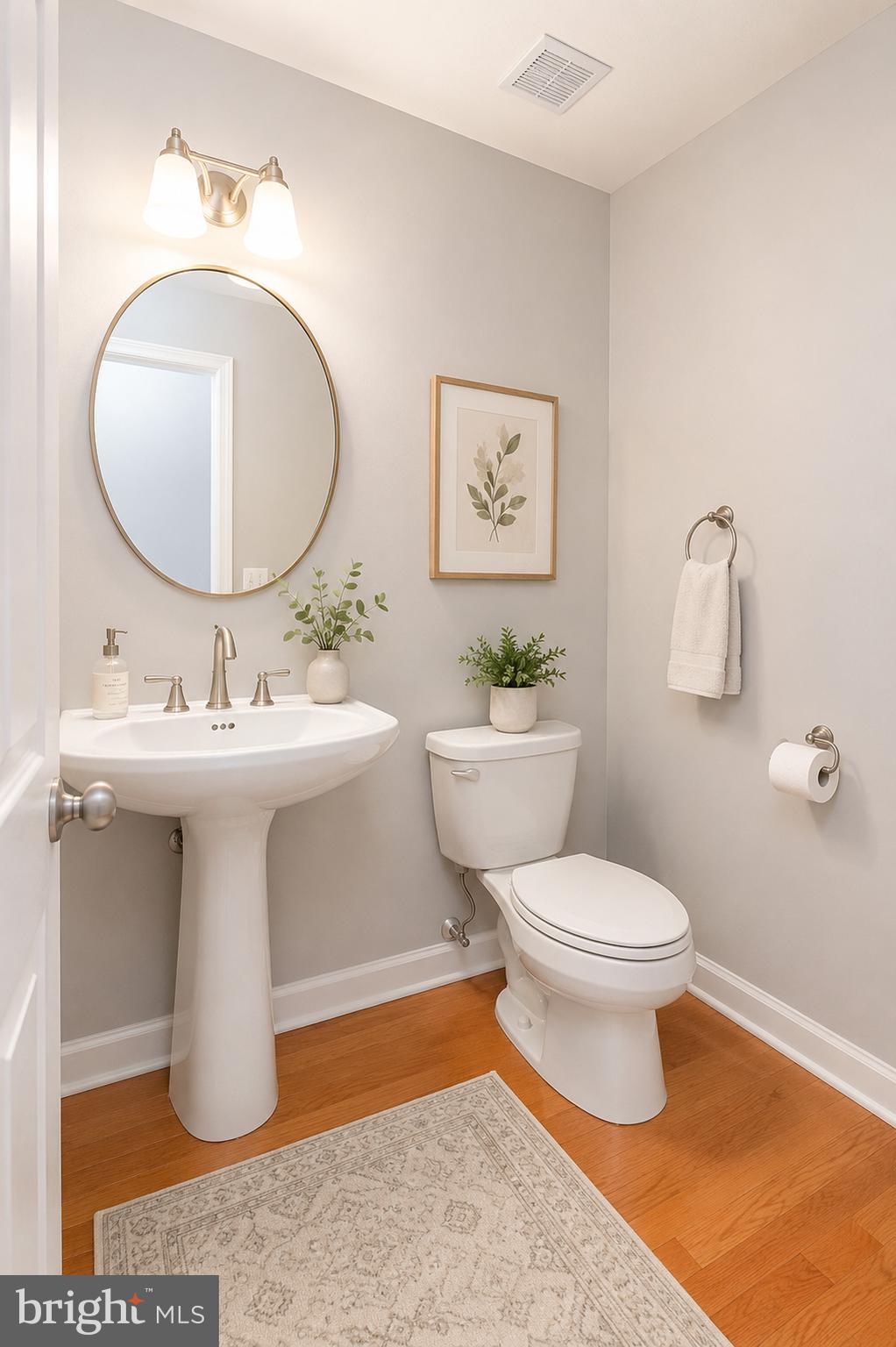 1510 Stack Street Baltimore, MD 21230 - Photo 4 of 32 a bathroom with a sink toilet and a mirror